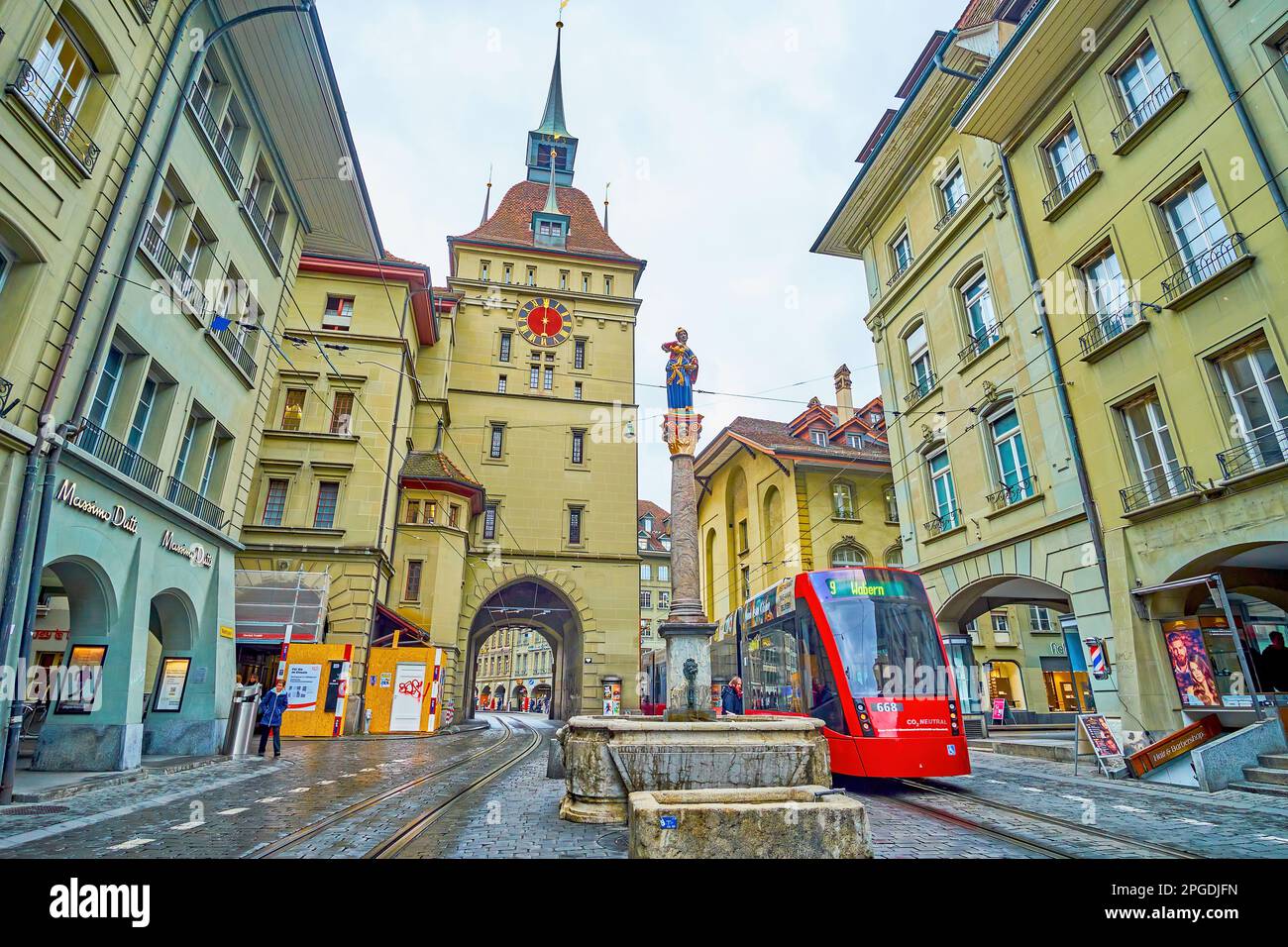 BERN, SWITZERLAND - MARCH 31, 2022: Tram line passing through Marktgasse street, one of the main in Altstadt district, on March 31 in Bern, Switzerlan Stock Photo