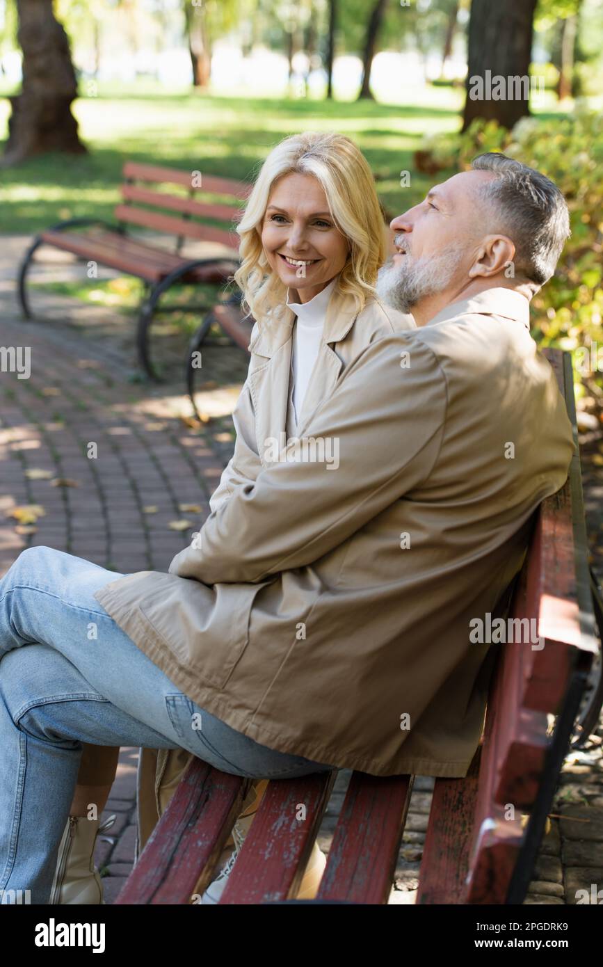 Mature woman on park bench hi-res stock photography and images - Alamy