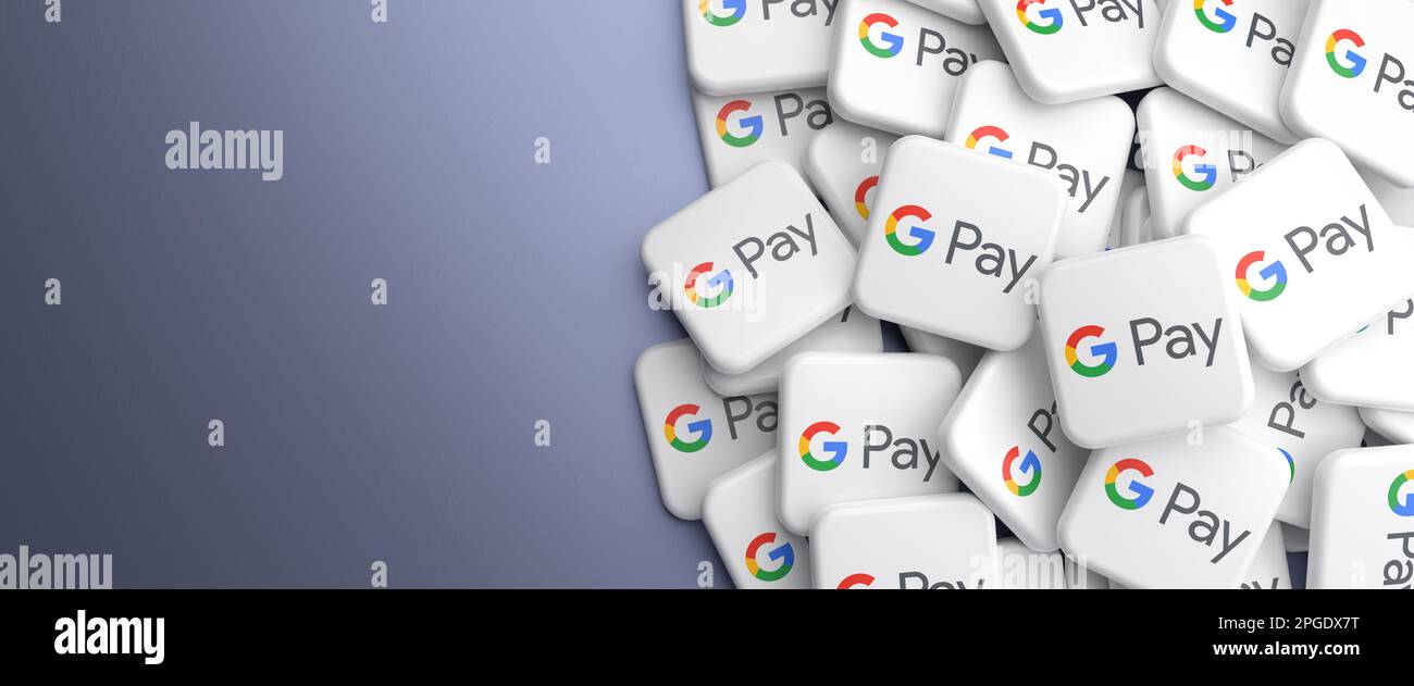 Logos of the payment solution Google Pay on heap on a table. Web banner format, copy space Stock Photo