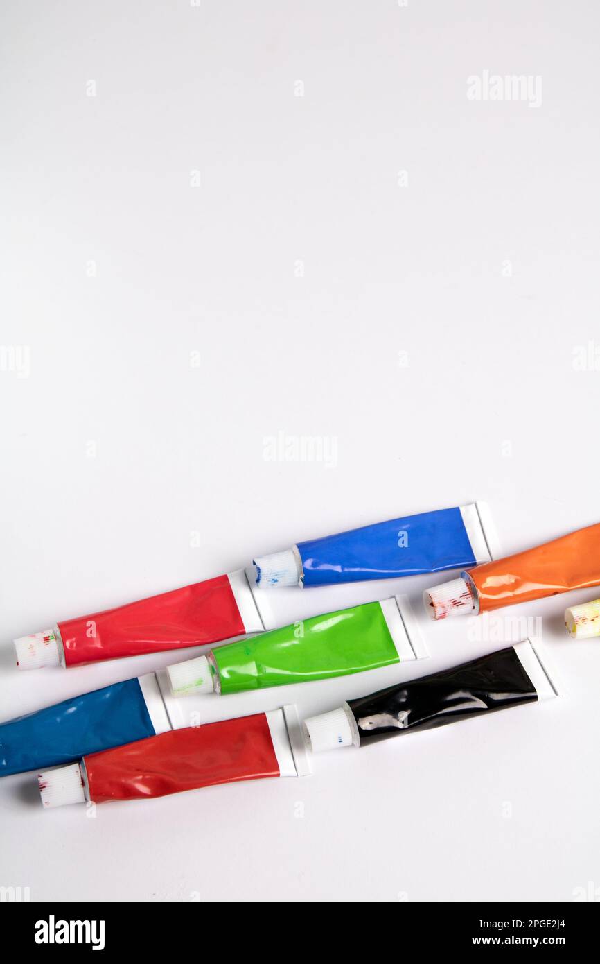 photo tubes with different colors of paint on a white background Stock Photo