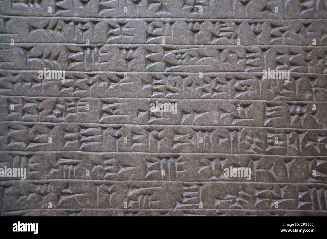 Cuneiform writing example from the Sumerian languages at the British Museum, London - cuneiform stone tablet Stock Photo