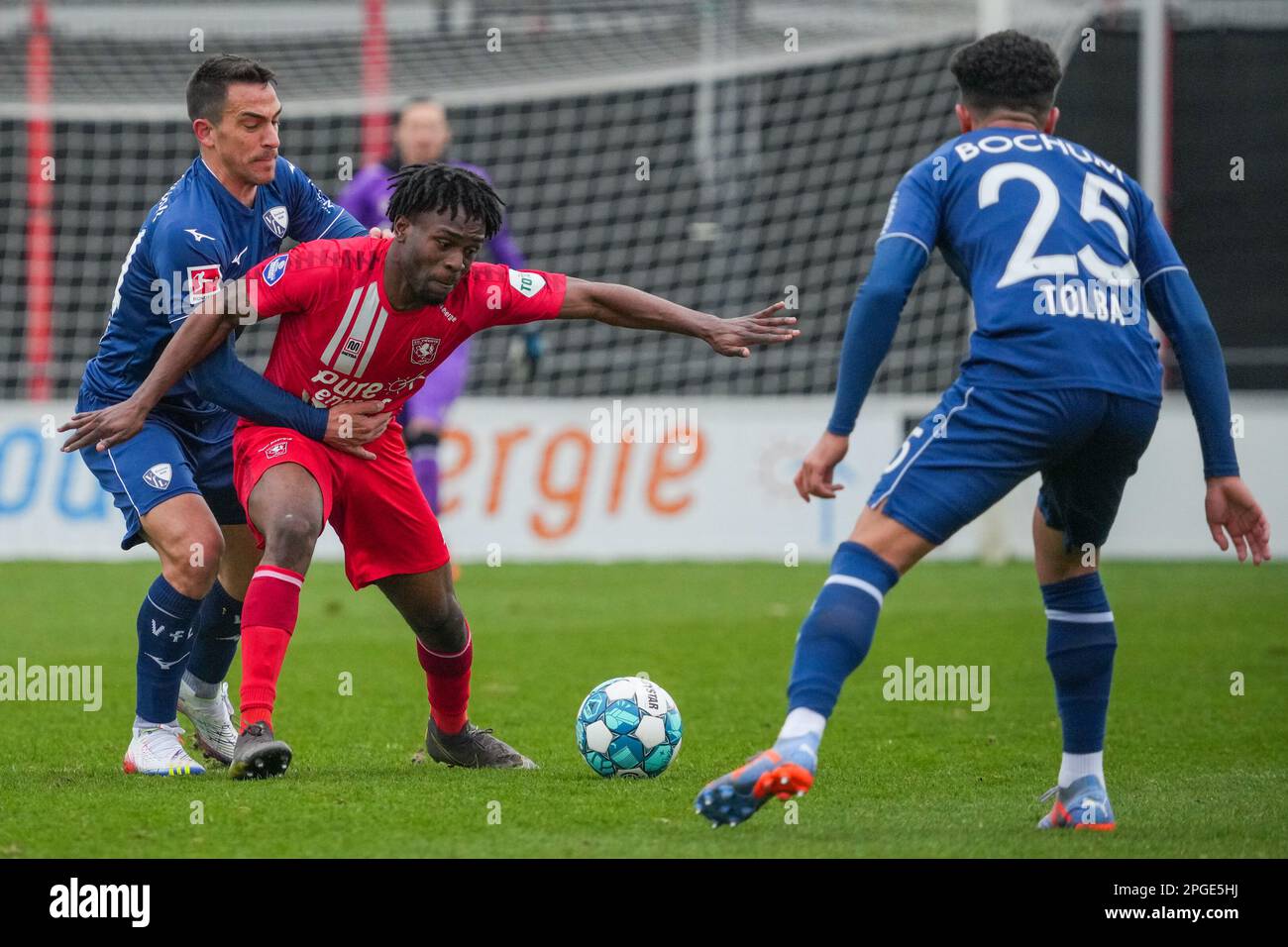 Hengelo, Netherlands. 22nd Mar, 2023. HENGELO, NETHERLANDS - MARCH 22: Noel  Futkeu of FC Twente battles for the ball with Mohammed Tolba of VfL Bochum  during the International Club Friendly match between