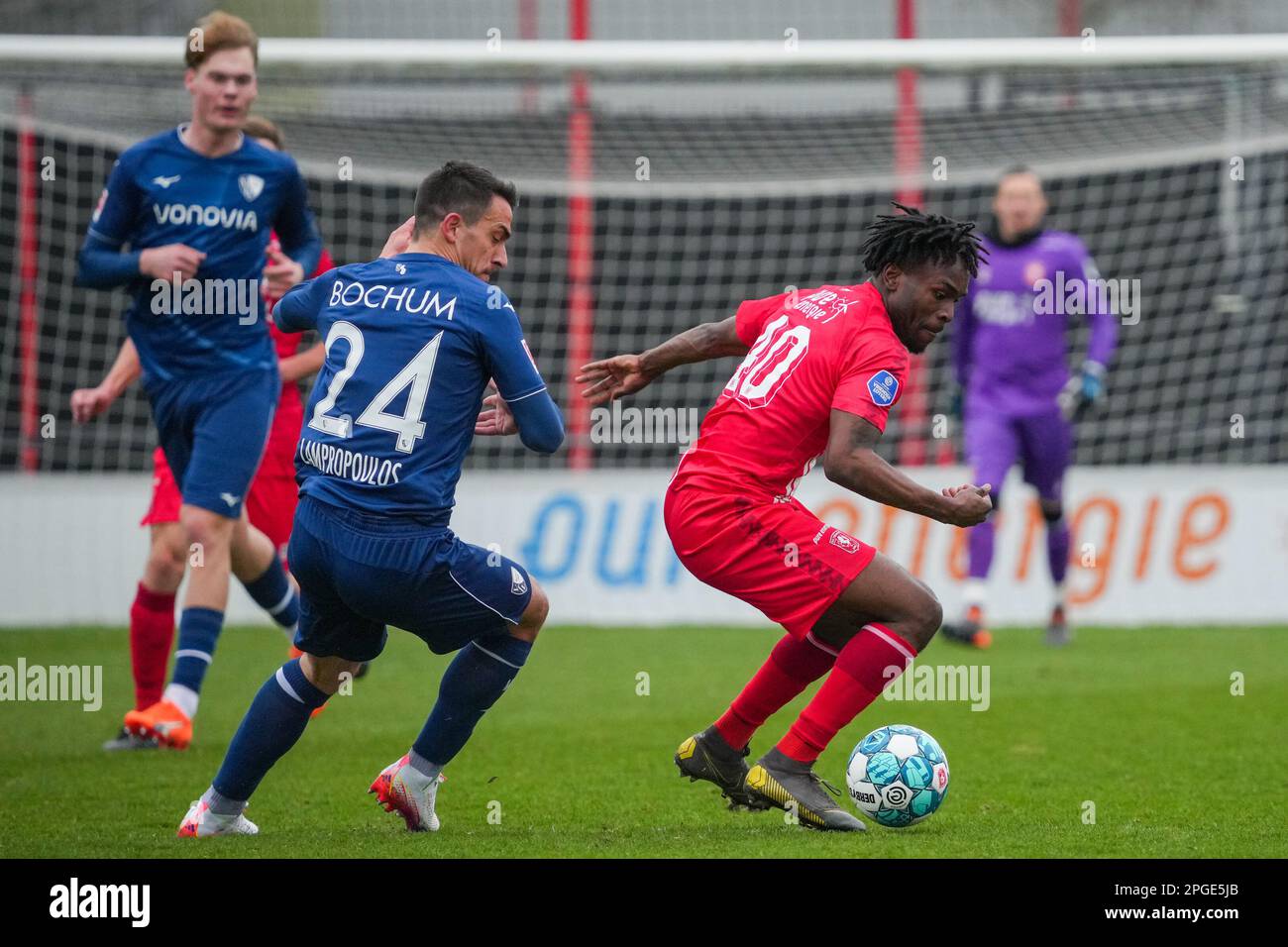 Hengelo, Netherlands. 22nd Mar, 2023. HENGELO, NETHERLANDS - MARCH 22: Noel  Futkeu of FC Twente battles for the ball with Mohammed Tolba of VfL Bochum  during the International Club Friendly match between