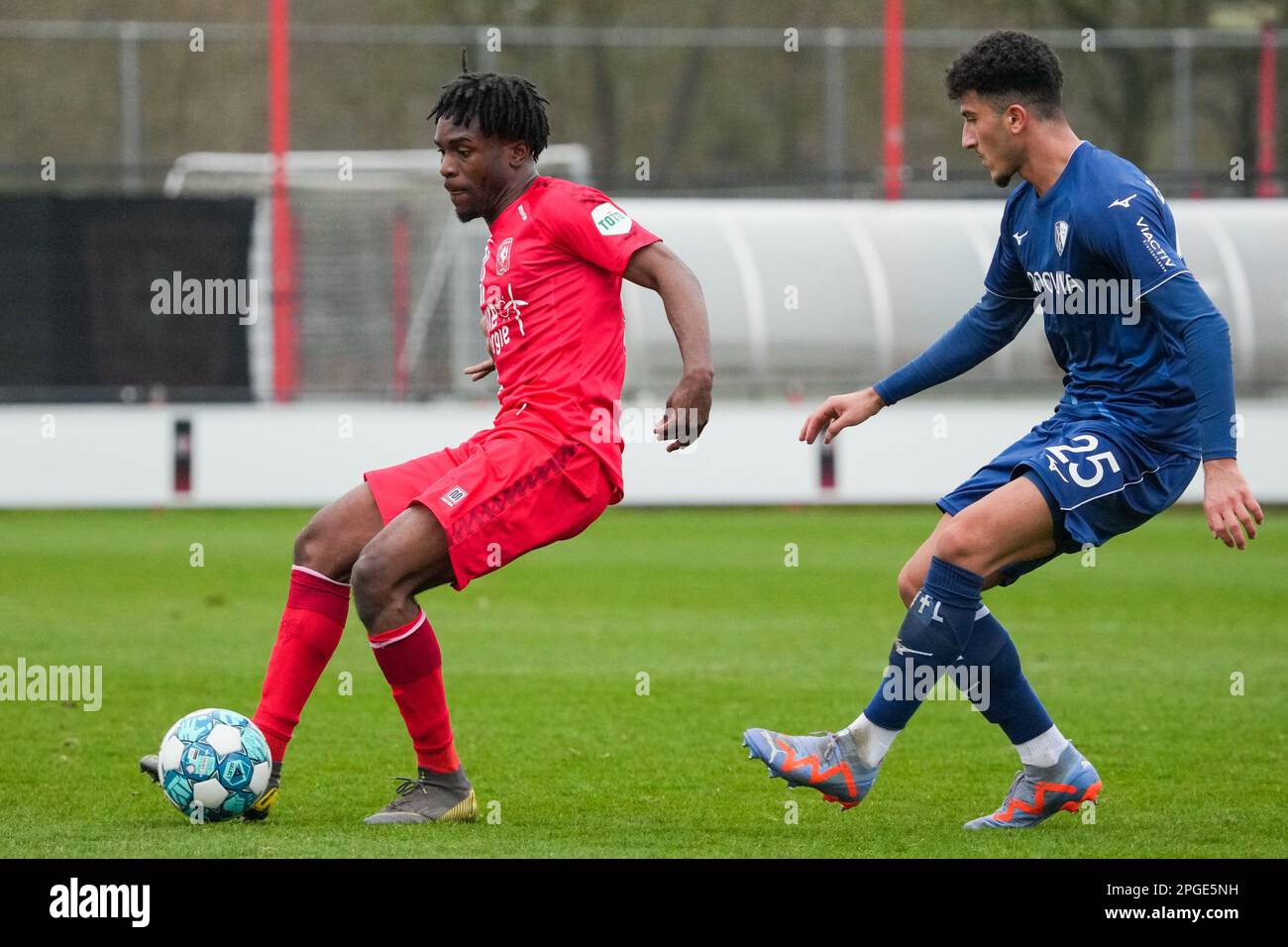 Hengelo, Netherlands. 22nd Mar, 2023. HENGELO, NETHERLANDS - MARCH 22: Noel  Futkeu of FC Twente battles for the ball with Mohammed Tolba of VfL Bochum  during the International Club Friendly match between