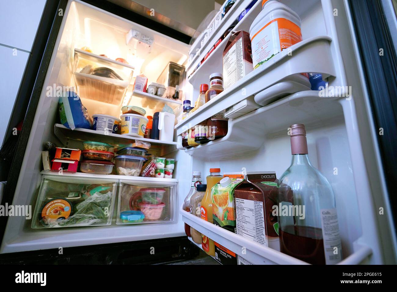 Open refrigerator with food inside Stock Photo Alamy
