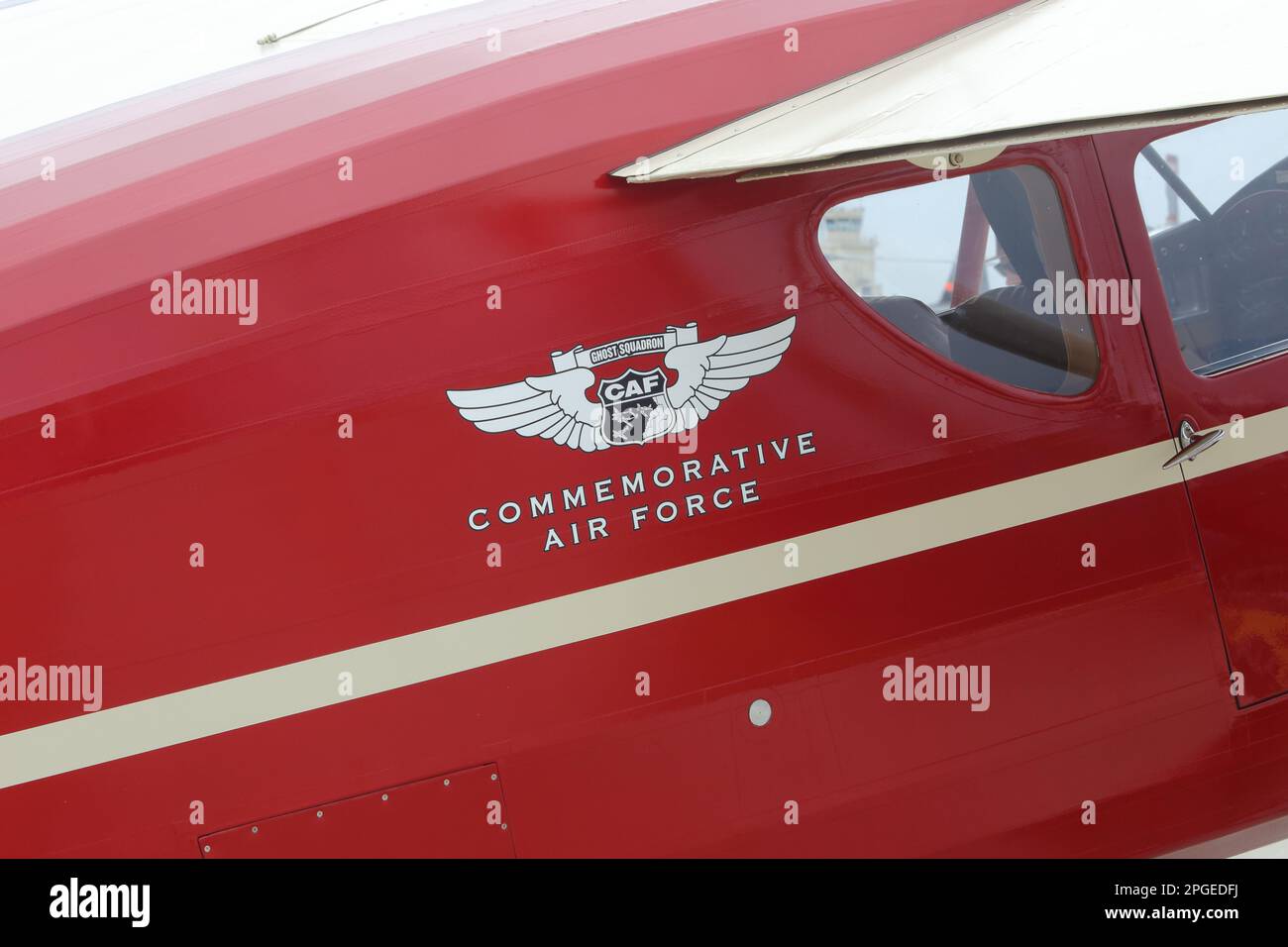 Point Mugu, California / USA - March 18, 2023: A Commemorative Air Force Ghost Squadron logo is shown on the side of a vintage airplane. CAF is an org Stock Photo