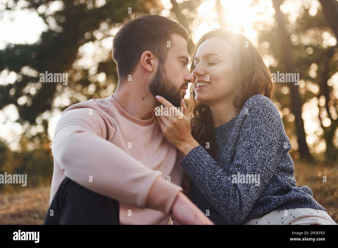 Closeness of the people. Cheerful lovely young couple having a rest ...