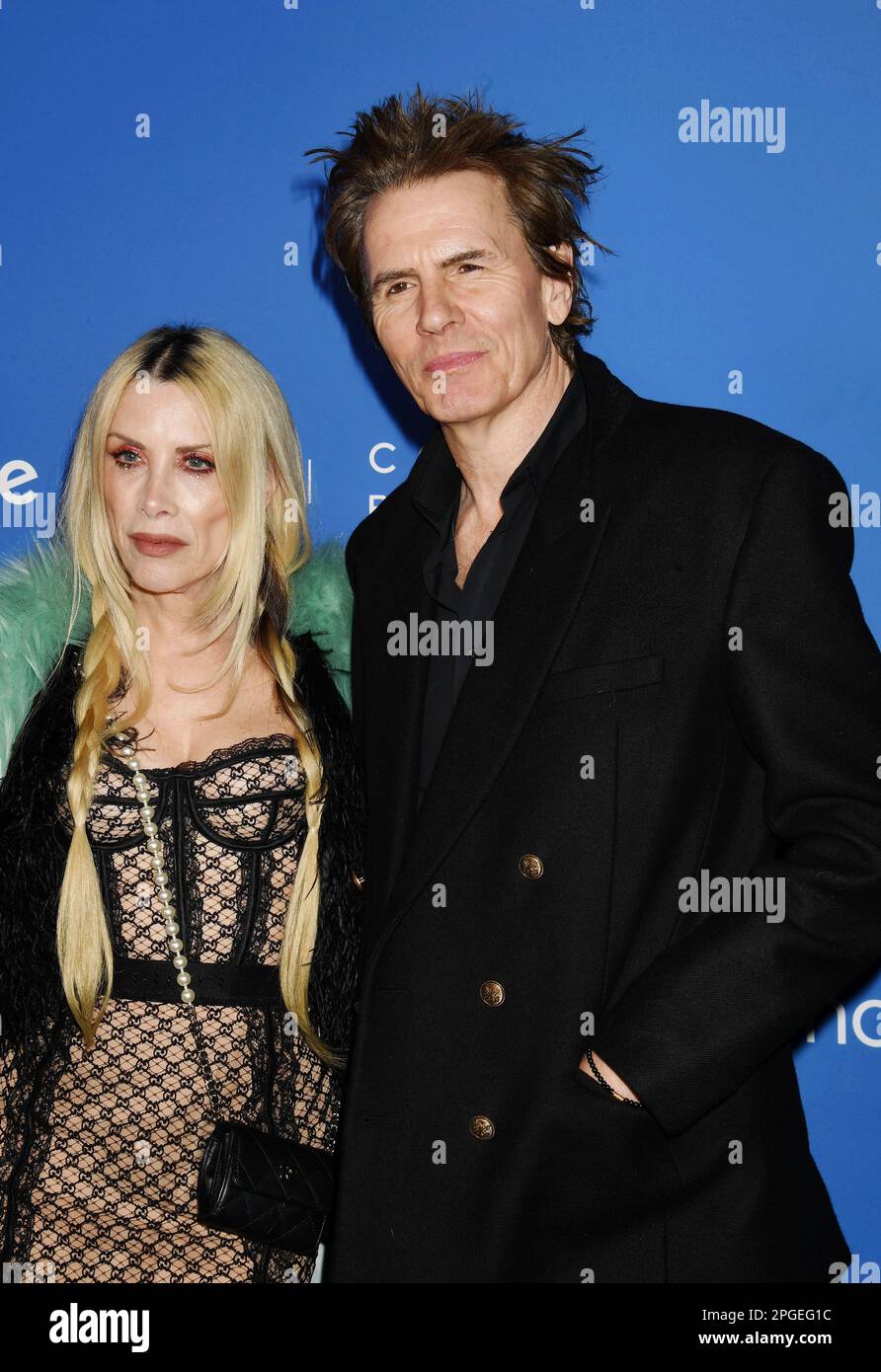 LOS ANGELES, CALIFORNIA - MARCH 21: (L-R) Gela Nash-Taylor and John Taylor attend the Fashion Trust US Awards at Goya Studios on March 21, 2023 in Los Stock Photo
