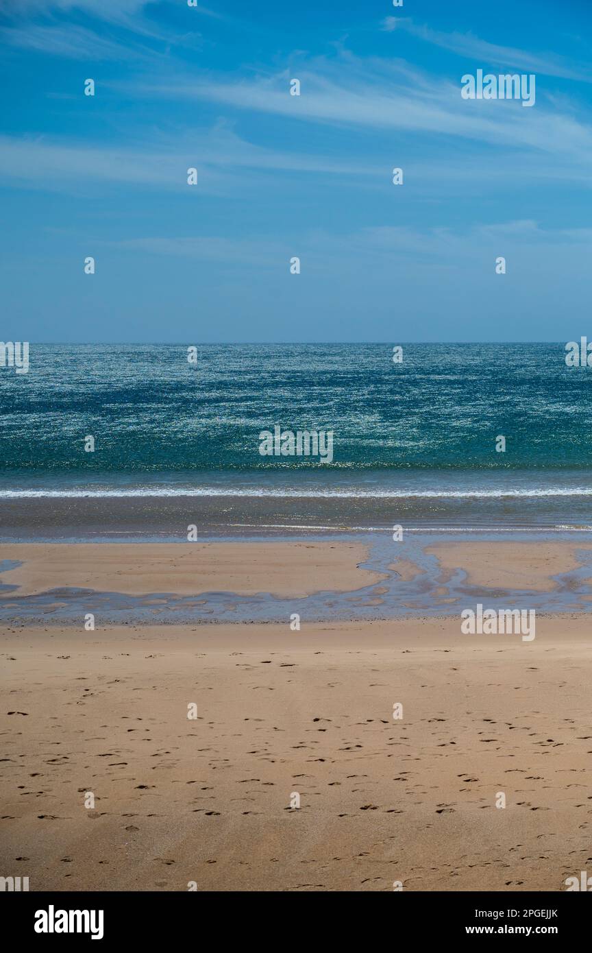 A view of the Mediterranean sea on the Algarve Portugal with th esun shining and the sea sparkling Stock Photo