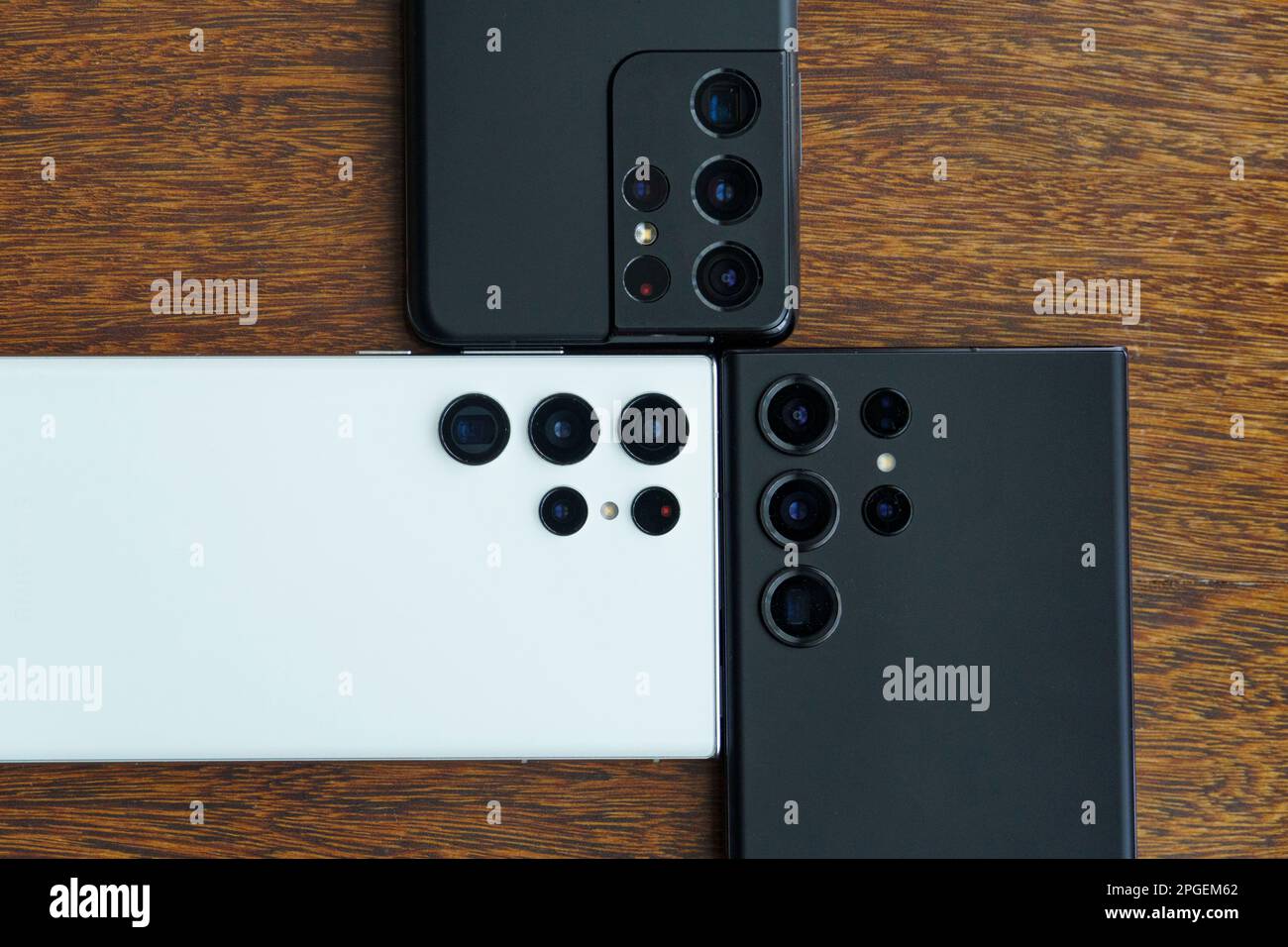 Close up of the ultrawide, normal and telephoto camera lenses on three flagship Samsung Galaxy