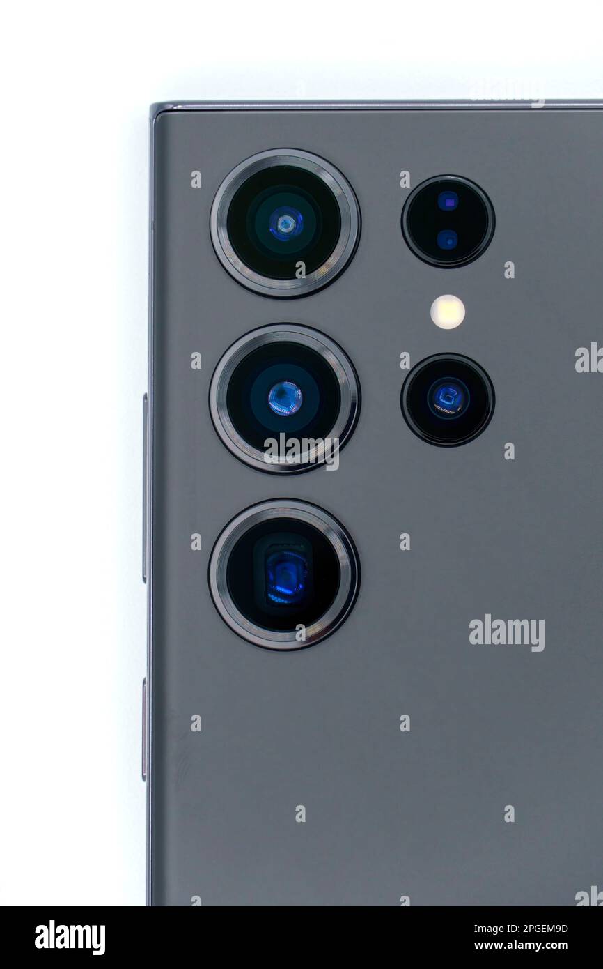 Close up of the camera lenses on a phantom black Samsung Galaxy S23 Ultra flagship Android smartphone on white background Stock Photo