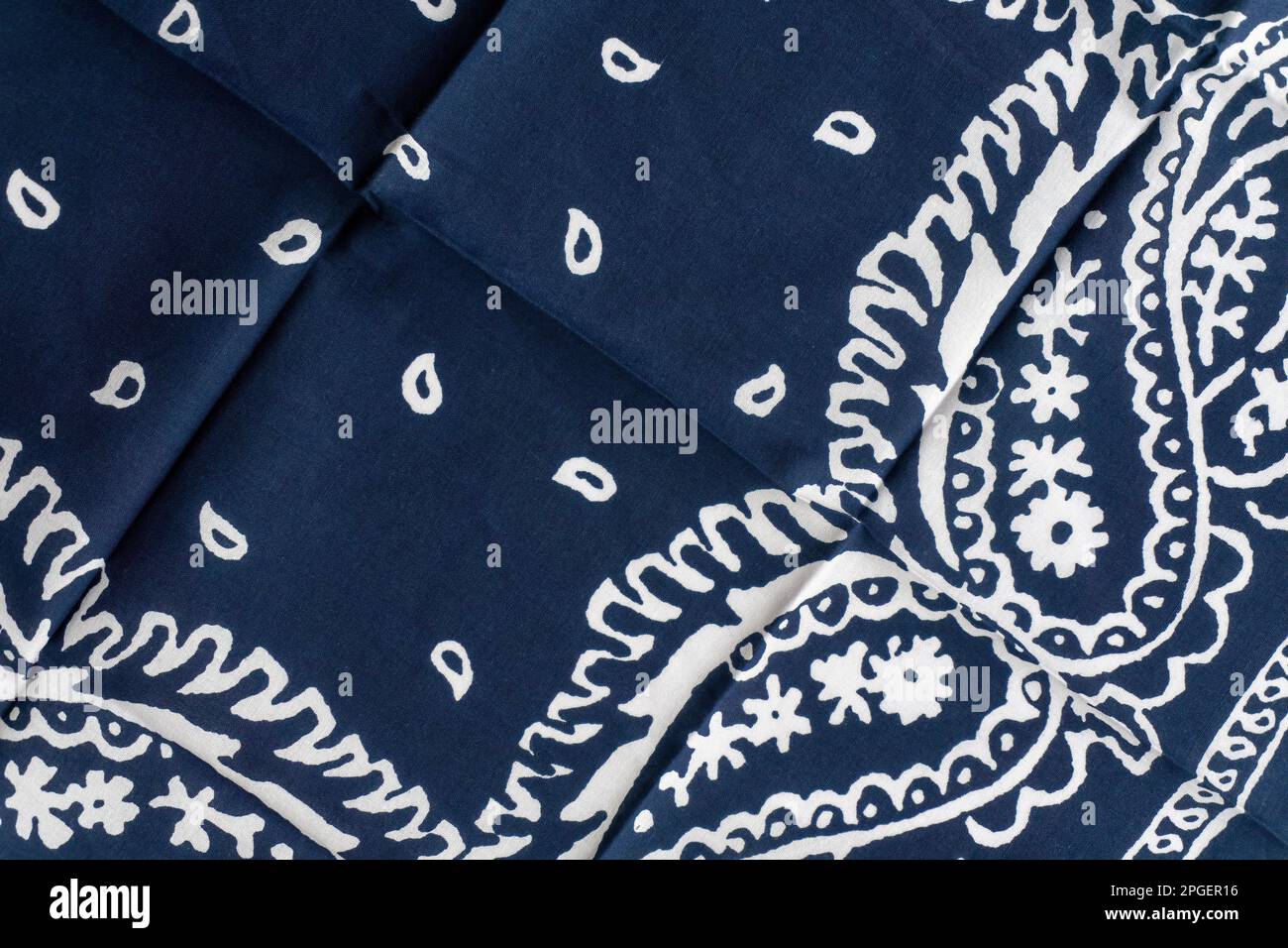 Navy blue bandana with white pattern background close up Stock Photo