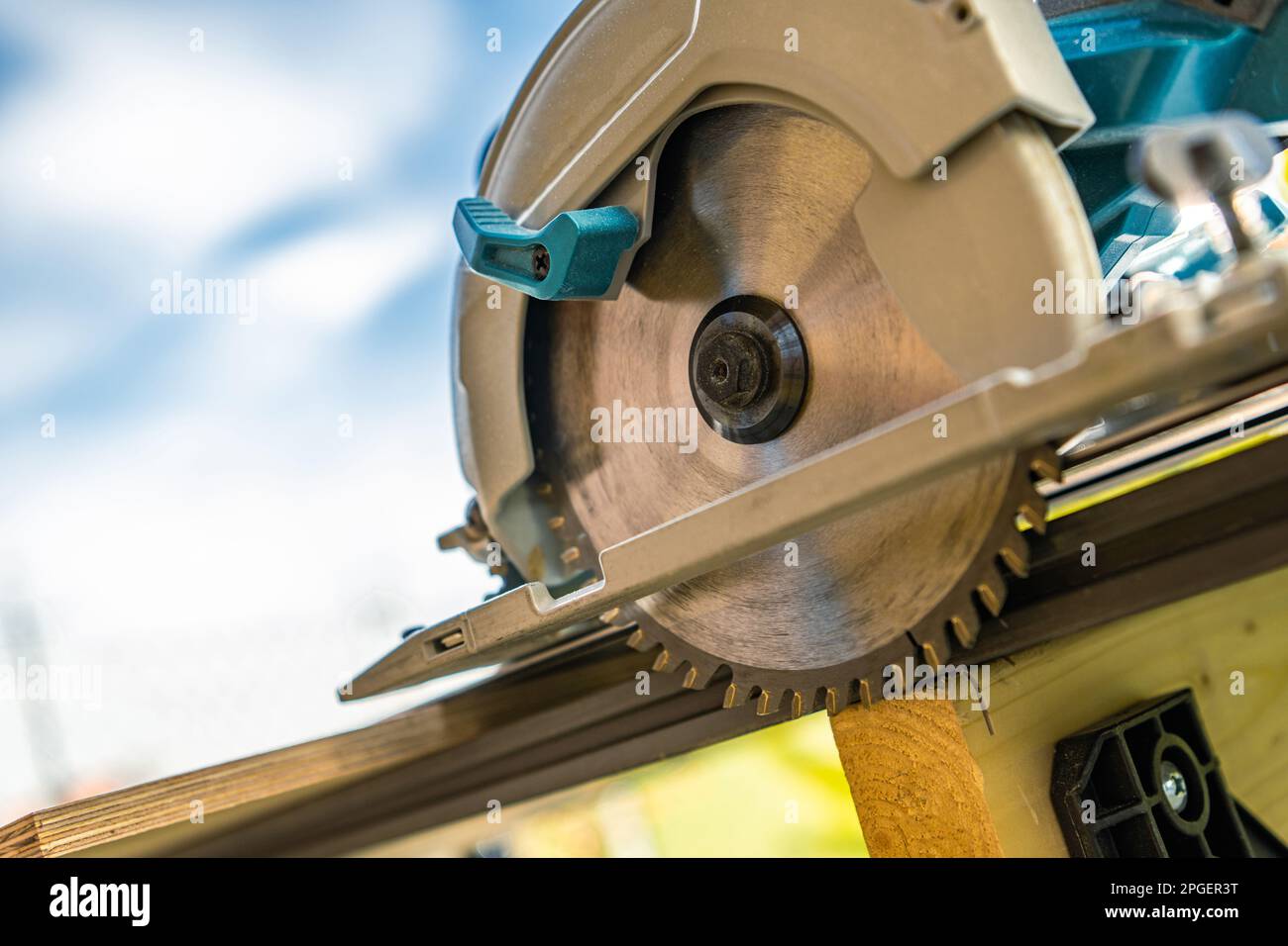Circular Handheld Wood Saw Inside the Workshop Close Up. Construction Industry Power Tools. Stock Photo