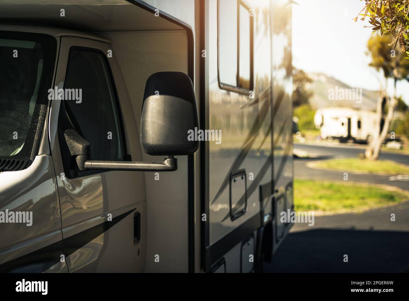 Class C Motorhome RV Vacation on the Road. Recreational Vehicle Theme. Stock Photo
