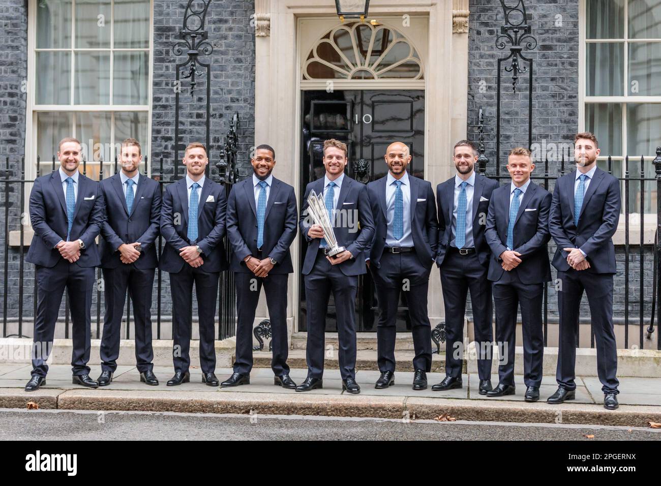 Downing Street, London, UK. 22nd March 2023. Jos Buttler and the England cricket team pose for photos following a reception in 10 Downing Street to celebrate winning the T20 World cup. They were accompanied by young players and other representatives of England Cricket. Photo by Amanda Rose/Alamy Live News Stock Photo