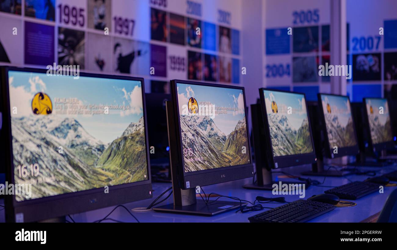 Desktop computers sit on a desk in a school computer lab Stock Photo ...