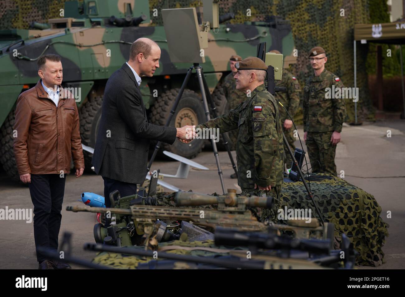 The Prince of Wales viewing military hardware with Polish Deputy Prime Minister and Minister of National Defence, Mariusz Blaszczak, during a visit to the 3rd Brigade Territorial Defence Force base, in Rzeszow, Poland, that has been heavily involved in providing support to Ukraine. Picture date: Wednesday March 22, 2023. Stock Photo