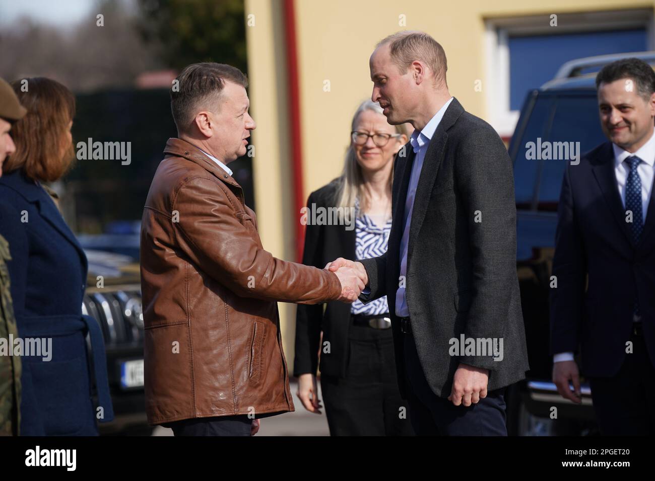 The Prince of Wales is greeted Polish Deputy Prime Minister and Minister of National Defence, Mariusz Blaszczak as he arrives for a visit to the 3rd Brigade Territorial Defence Force base, in Rzeszow, Poland, that has been heavily involved in providing support to Ukraine. Picture date: Wednesday March 22, 2023. Stock Photo