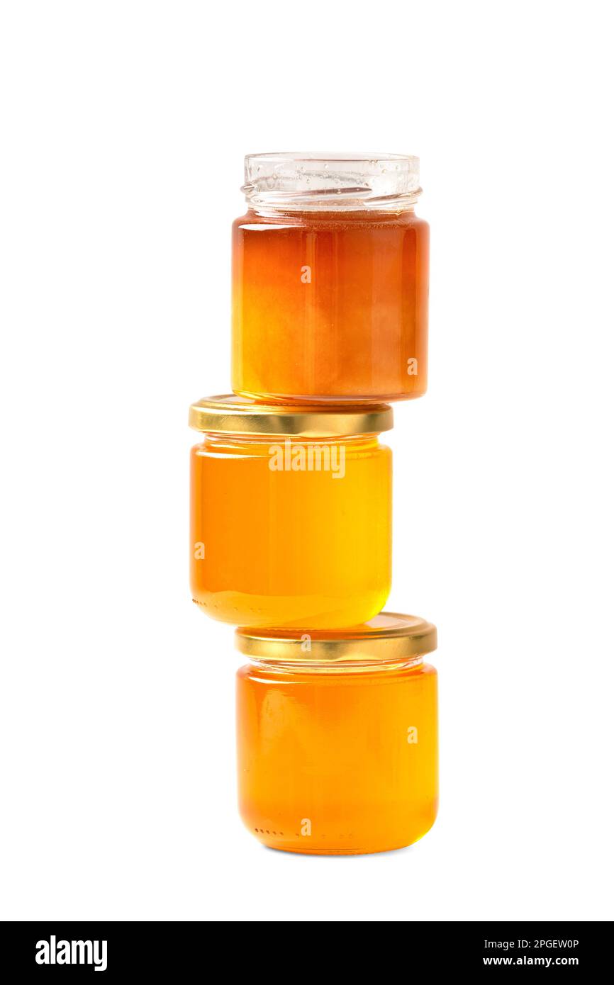 Honey in glass jars with. Organic honey in jars on a white background