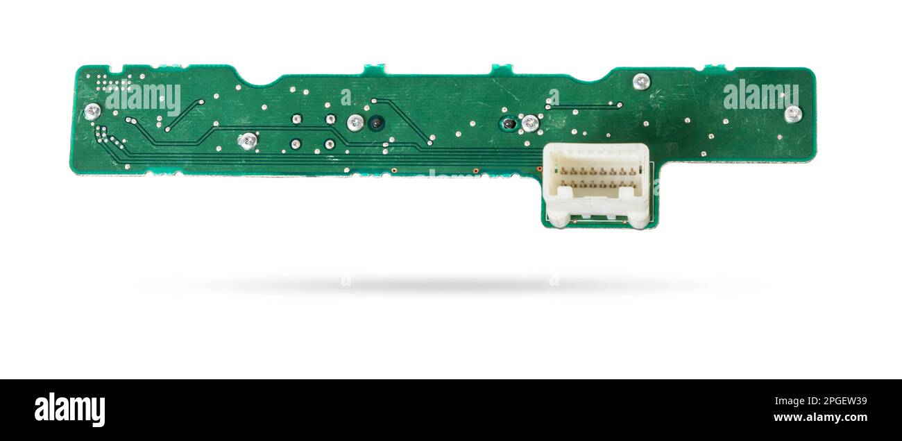 Green printed circuit board with transistors and microchips to control various devices Stock Photo