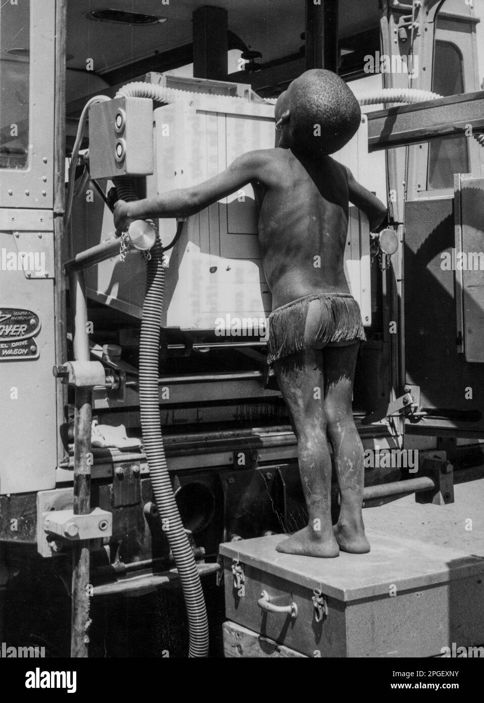 Africa, a indigenous boy is getting a tbc check with a mobile ...