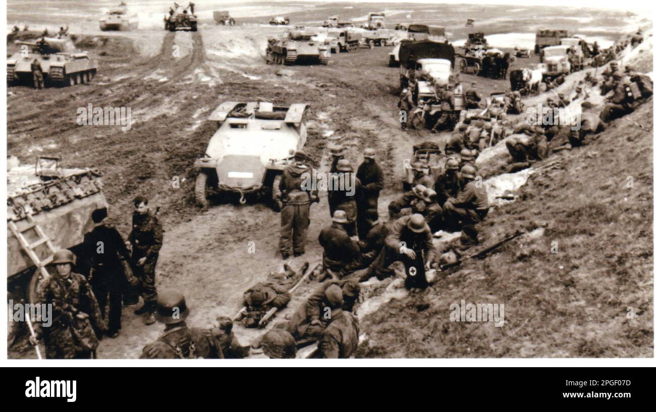 World War Two B&W photo German Soldiers of the 5th SS Panzer Division Wiking with Panther Tanks and Halftracks recovering from previous action Eastern Poland May 1944. SS KB Baumann Stock Photo