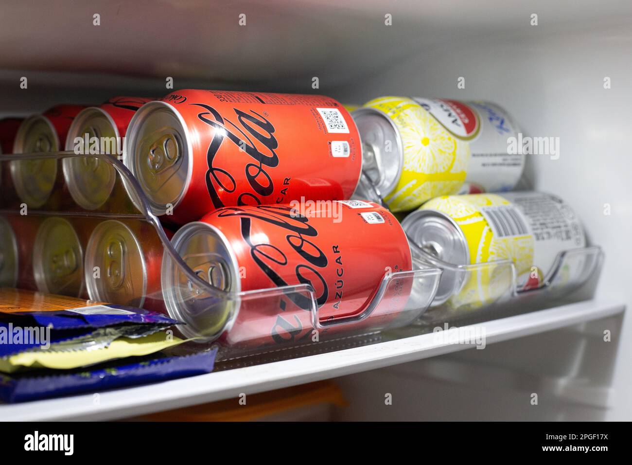 cans of sugarfree Coca Cola soft drinks in a home refrigerator