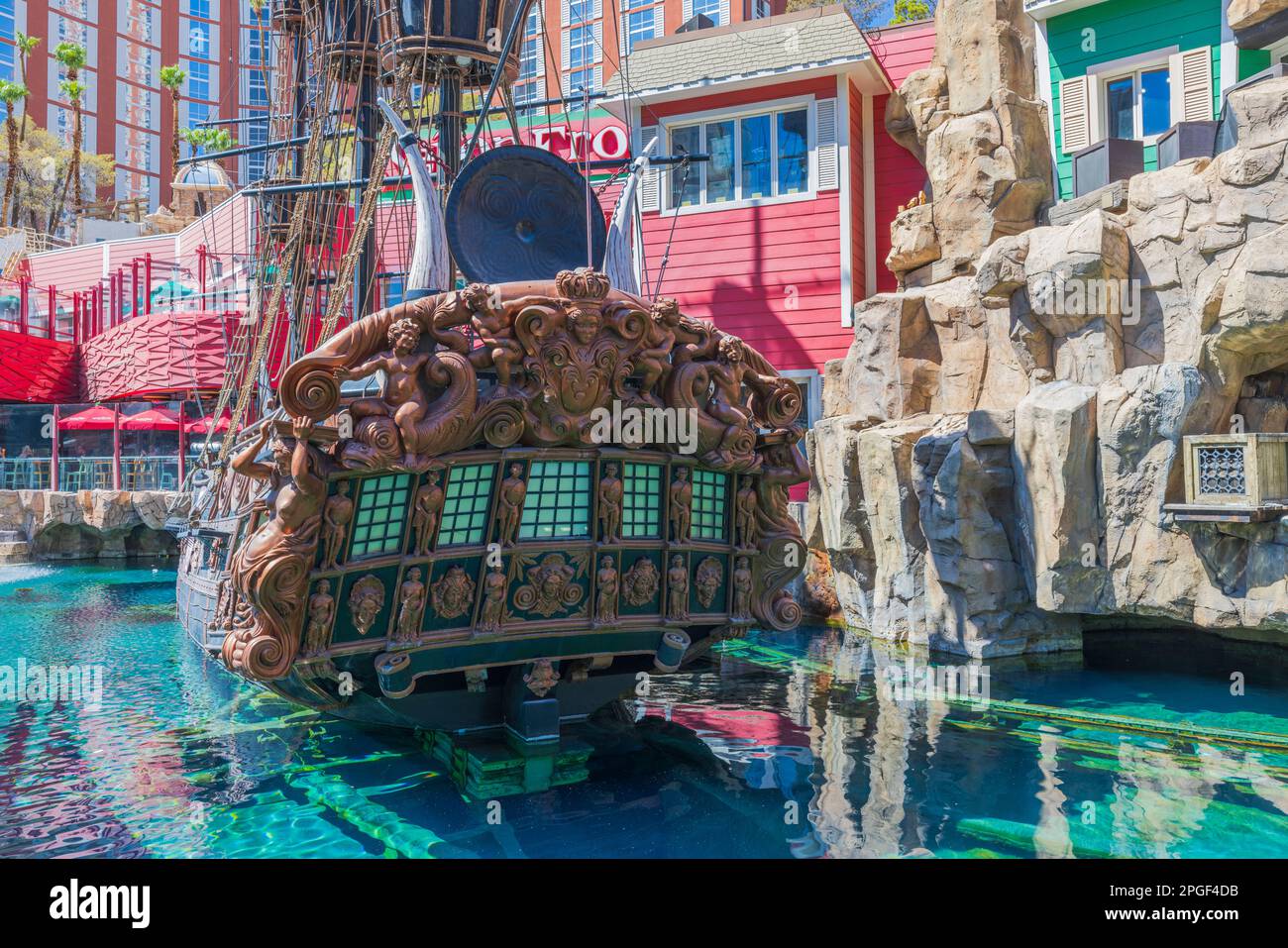Beautiful view of colorful decorated pond with pirate ship near hotel Treasure Island.  Strip, Las Vegas. USA. Stock Photo