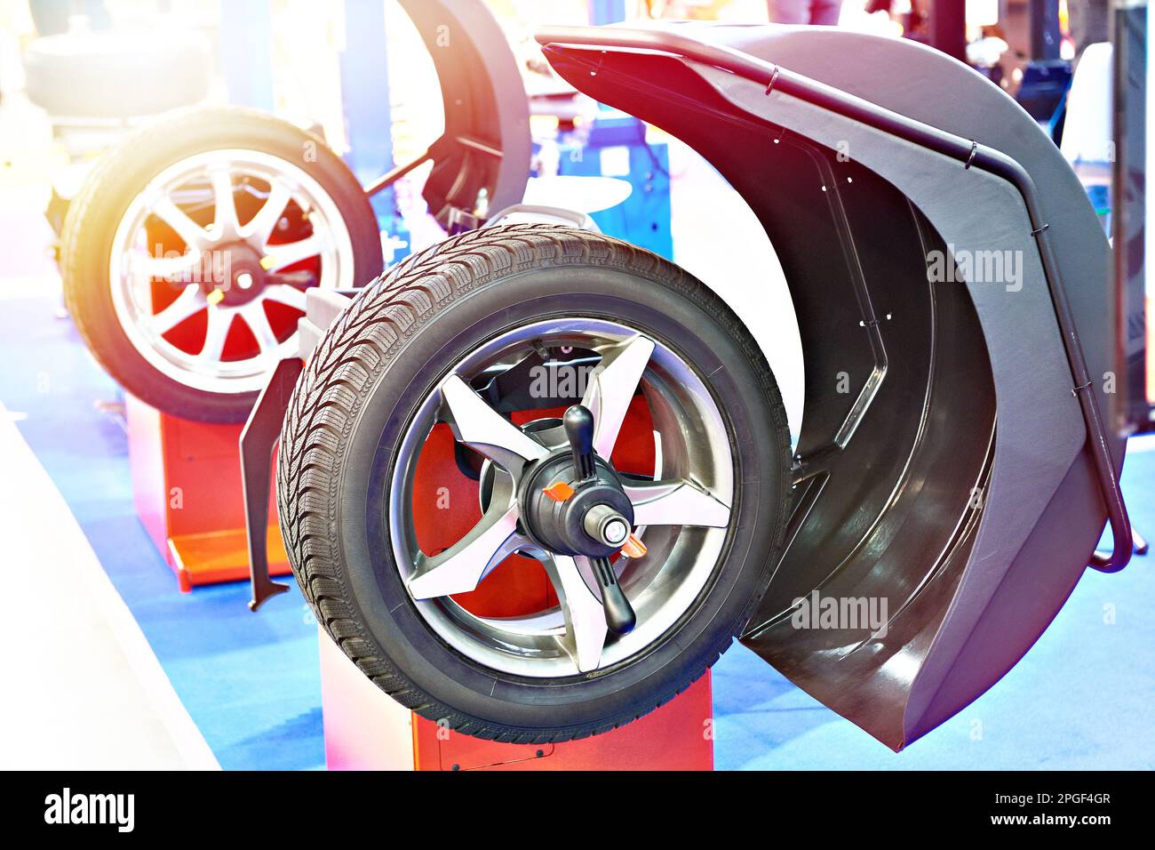 Stand for balancing the wheels of the car Stock Photo Alamy