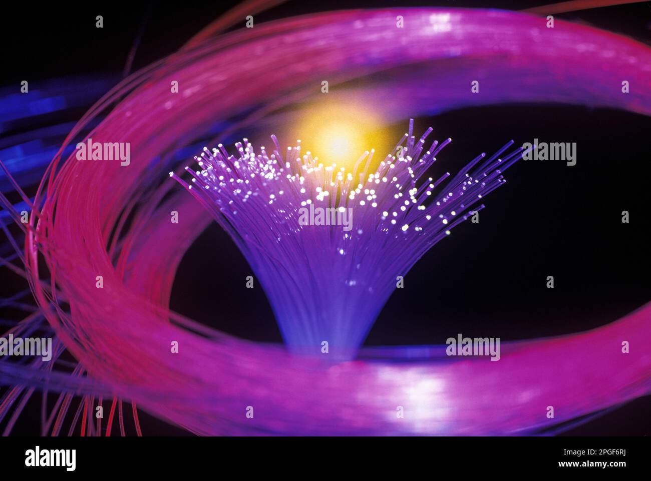 LIT TIPS OF FIBER OPTIC STRANDS (©KECK MAURER & SCHULTZ / CORNING GLASS