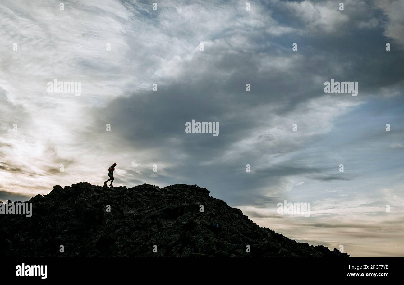 Person walking along summit hi-res stock photography and images - Alamy