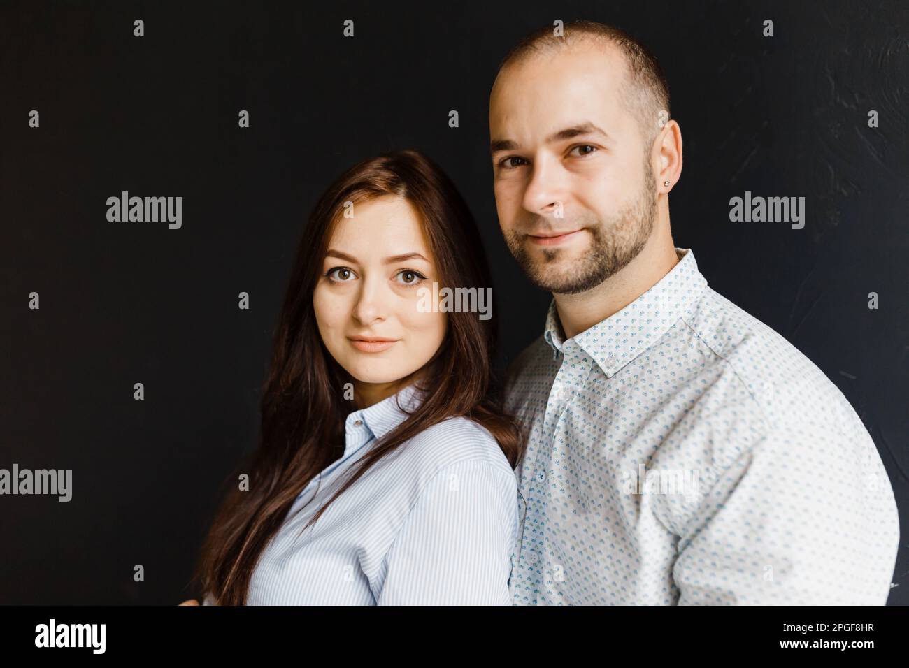 man and a woman in love pose for a family portrait, hugging Stock Photo ...