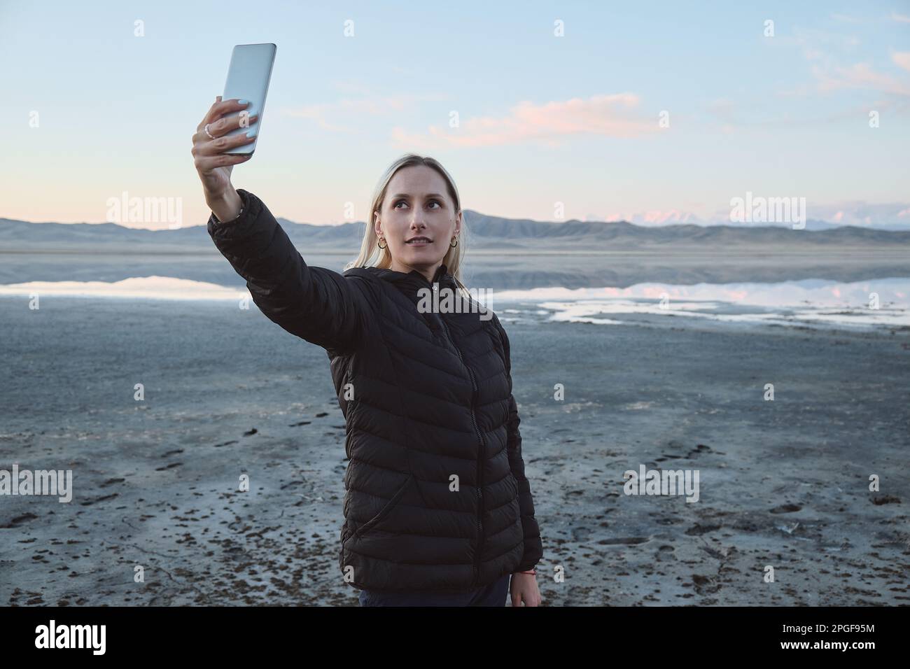 Woman traveler takes selfie in hi-res stock photography and images - Alamy