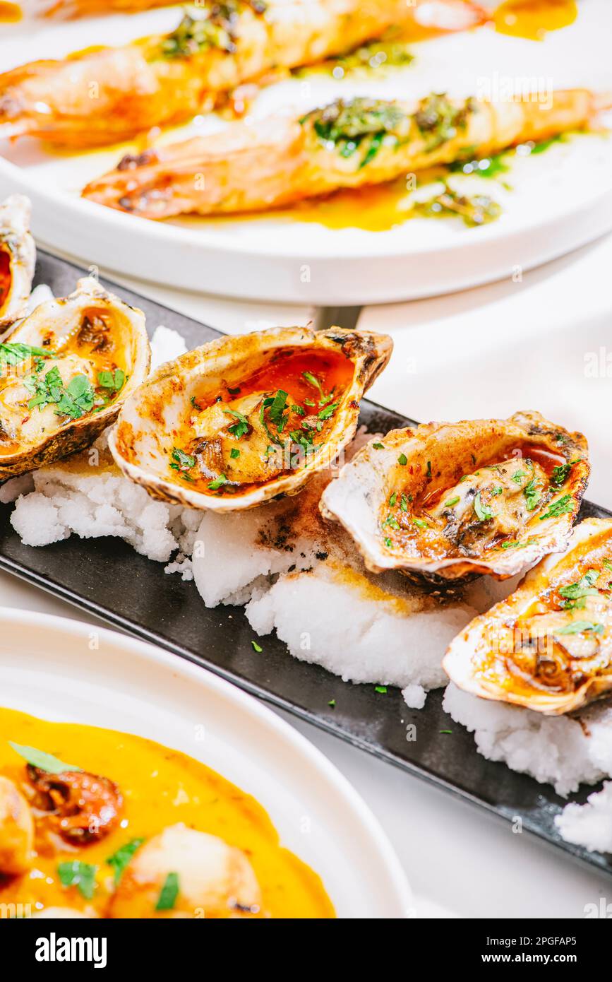 oyster and different seafood dishes Stock Photo Alamy