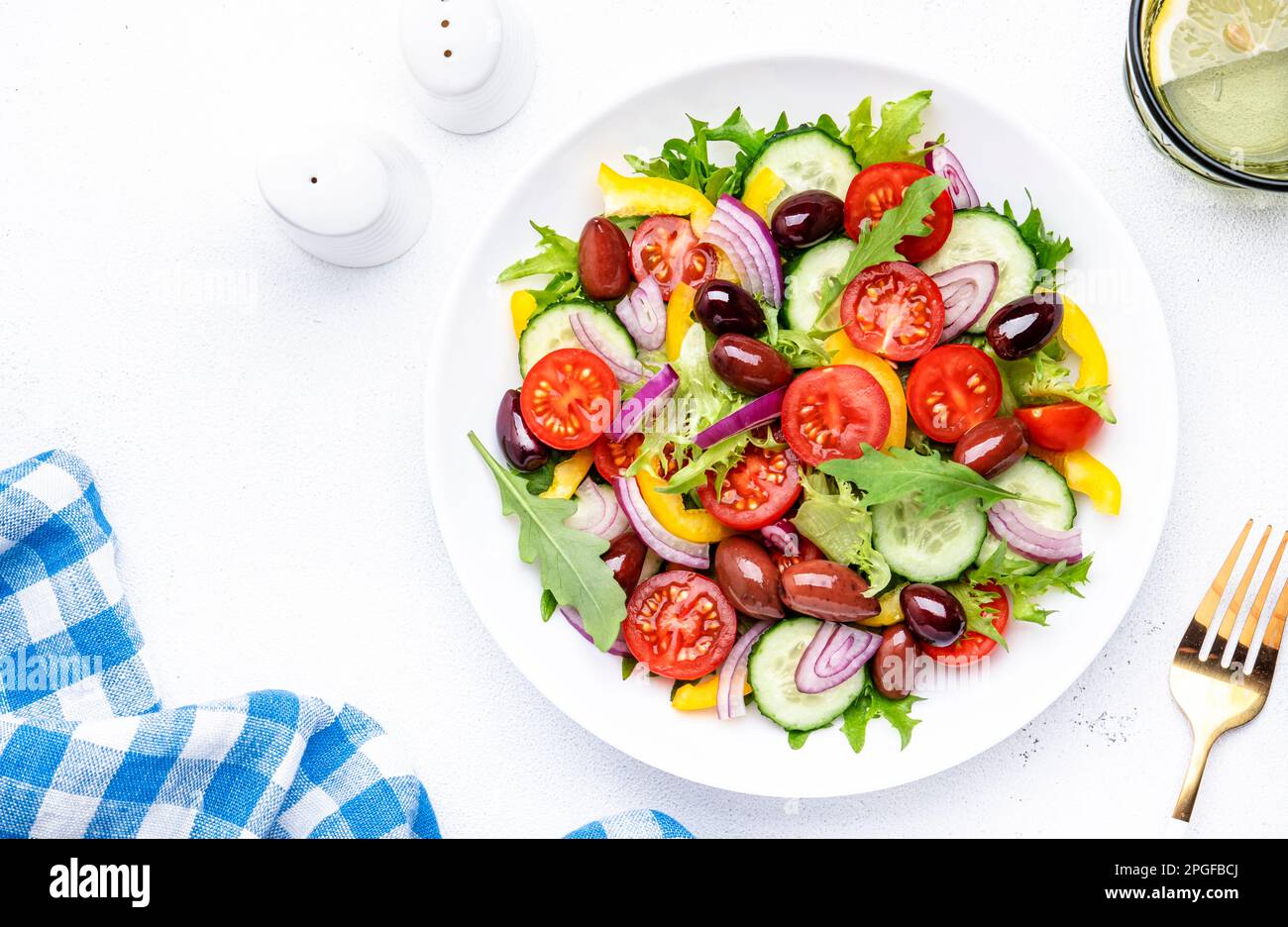 Vegan greek salad with kalamata olives, cherry tomato, yellow paprika