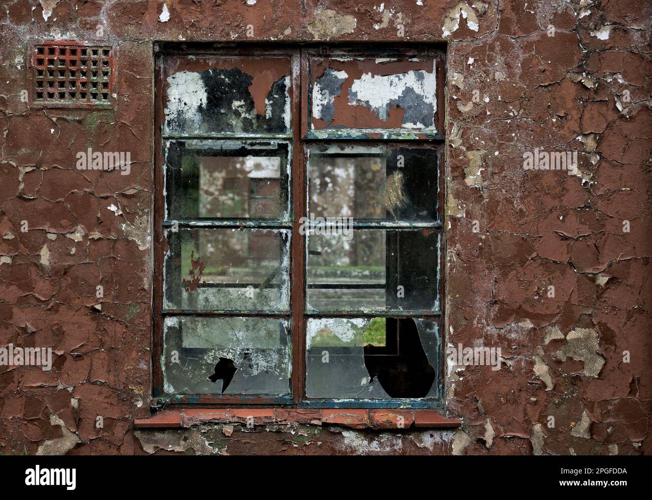 colour image of an old world war two building at a disused airfield in oxford uk Stock Photo