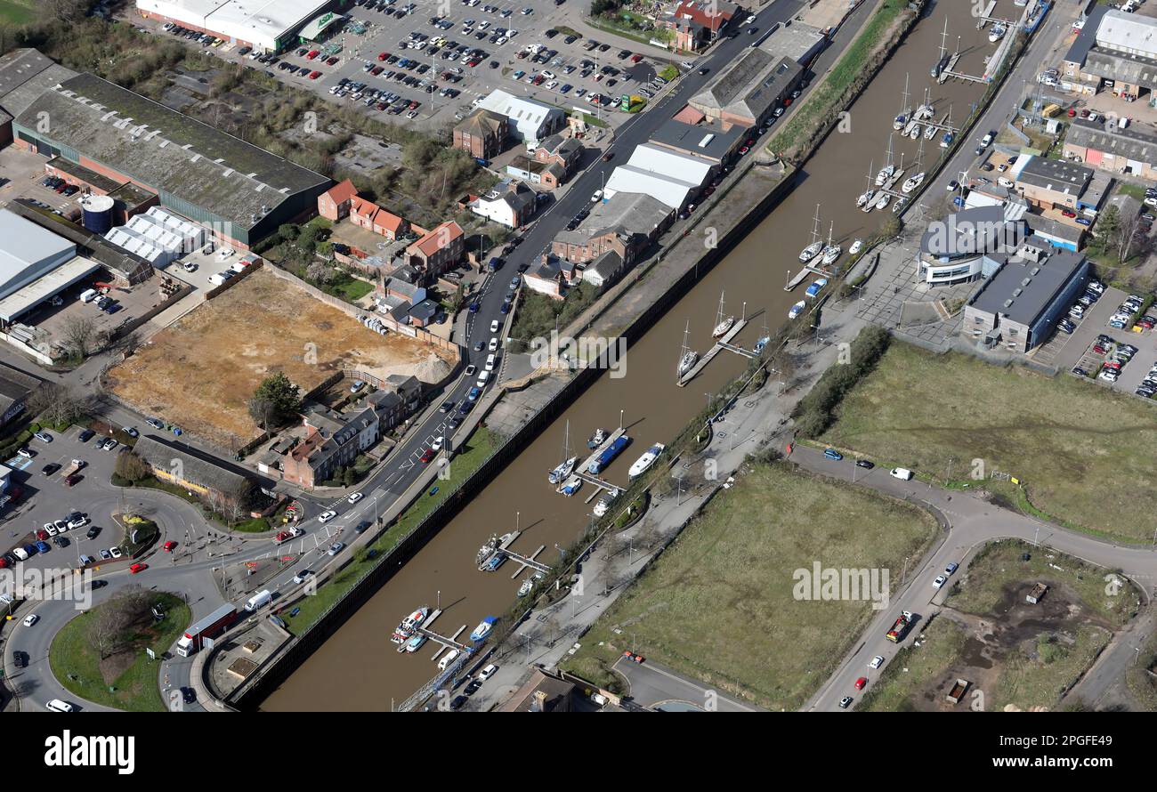 aerial view of boats moored up on the River Nene, The Herb Bank Garden & Boathouse Business Centre in Wisbech town, Cambridgeshire Stock Photo