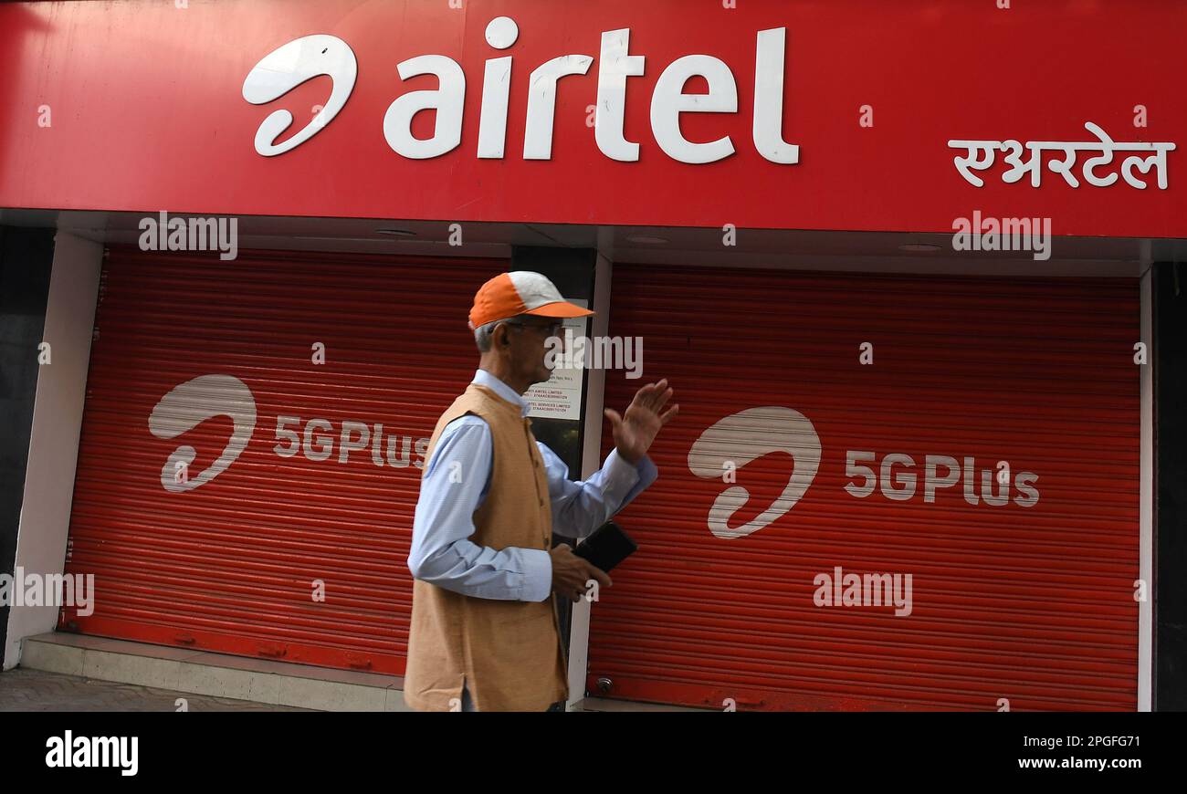 Mumbai, India. 22nd Mar, 2023. A man walks past the Airtel store in Mumbai. Airtel is offering