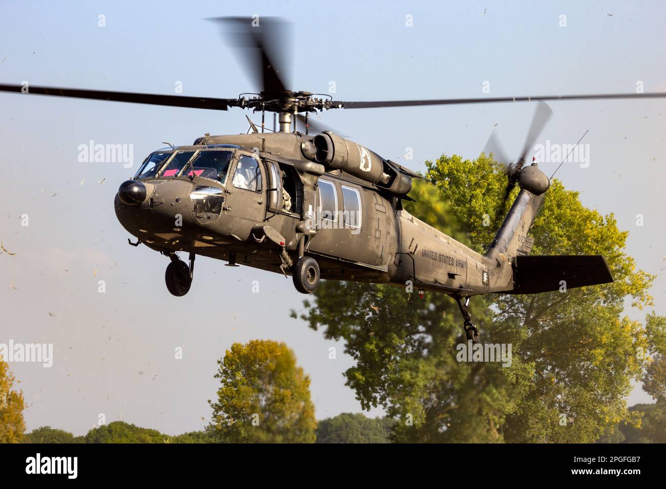 US Army UH60 Black Hawk helicopter arriving at a landing zone. Grave