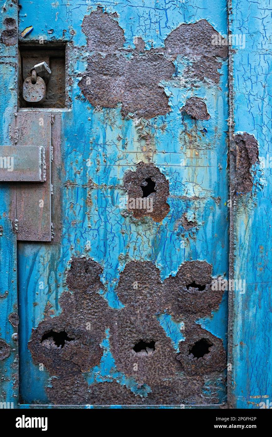 Rusted steel door with peeling paint Stock Photo Alamy