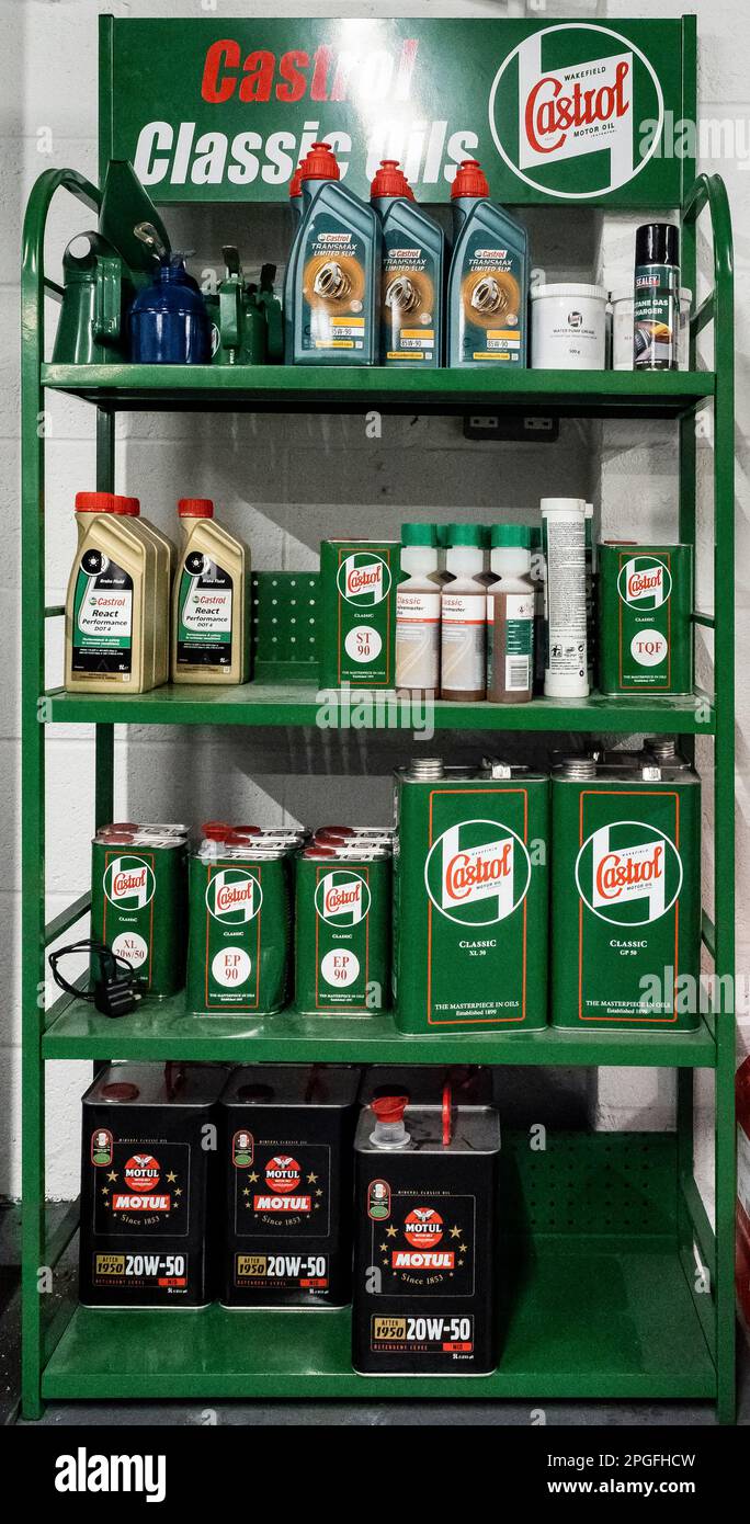 A Castrol Oil rack for classic car lubricants, green. Stock Photo