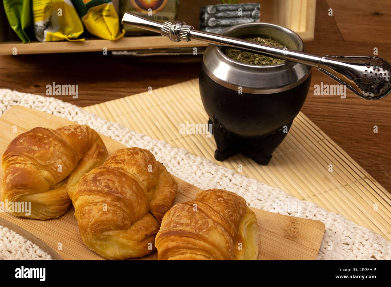 Uruguayan breakfast. Croissants and preparation of mate. Yerba mate