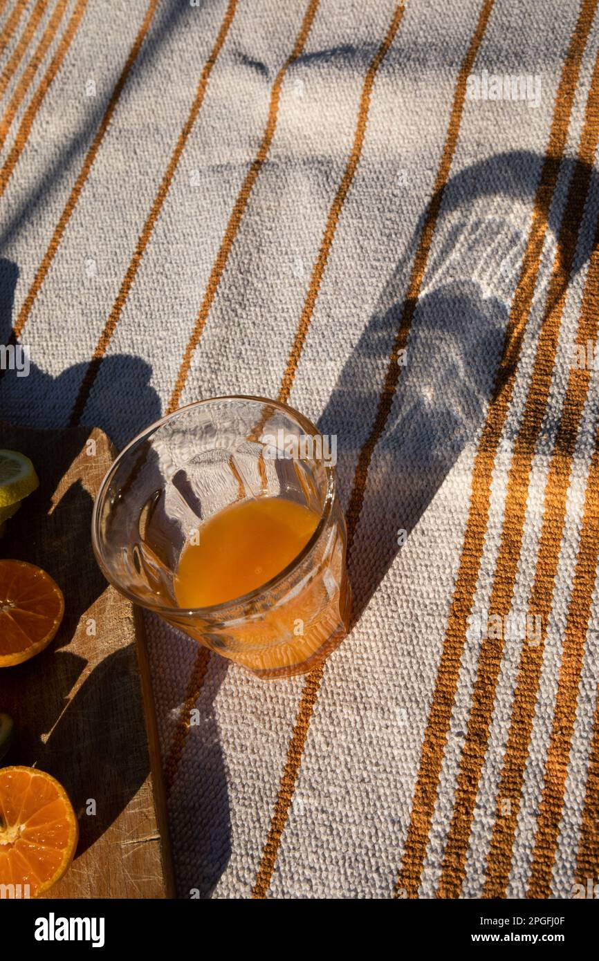 Fresh Orange Juice with Linen Tablecloth Stock Photo