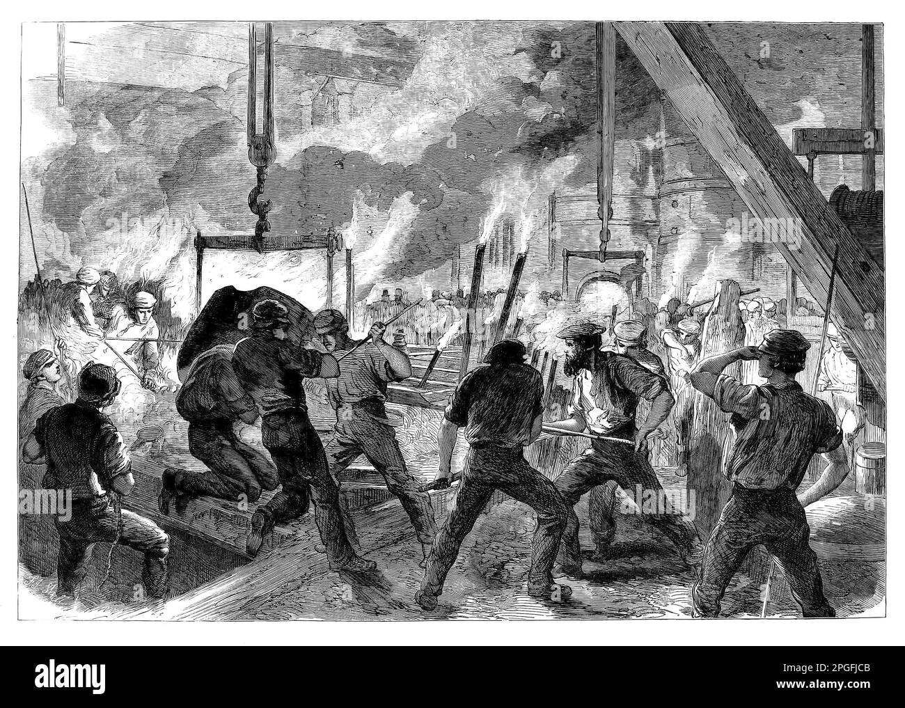 Casting a large cylinder at the Canal Ironworks, circa 1864. It was established on the City Canal that crossed the Isle of Dogs from Blackwall Reach to Limehouse Reach, built by The City of London Corporation with public funds and opened in 1805. The buildings which had previously served the area’s fishing industry were swept aside to make way for shipyards, dry docks and ironworks. By 1809 Coulson & Company had built the iron foundry, reputedly London's largest. Stock Photo