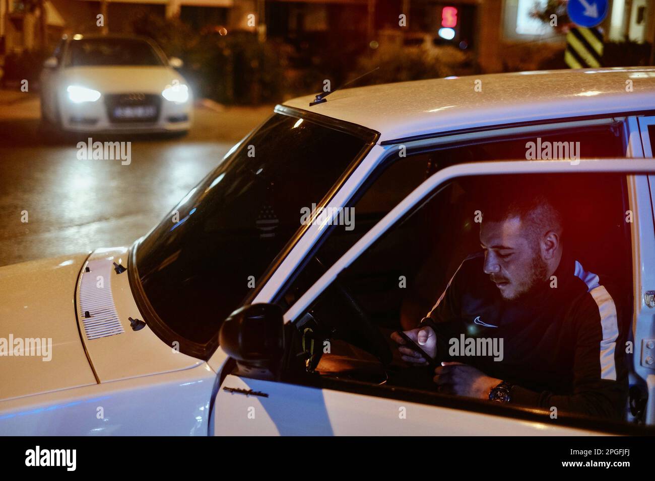 Izmir, Izmir, Turkiye. 22nd Mar, 2023. These vehicles, which are the stars of the 90s from subculture to families, are still a symbol of expression and rebellion, as well as being a vehicle for some members of the society in Turkey''¦ Mr Oguz; the young person in the photo, loves his vehicle very much. He cleans it every evening after daily use in Bornova district of Izmir''¦ The Tofas Murat 131, Sahin, Dogan, and Kartal are Turkish versions of the old Fiat 131 (older models) automobile made in the Turk Otomobil Fabrikasi A.S. factory in Bursa, Turkey. While dogan means ''falcon'' in Turkish, Stock Photo