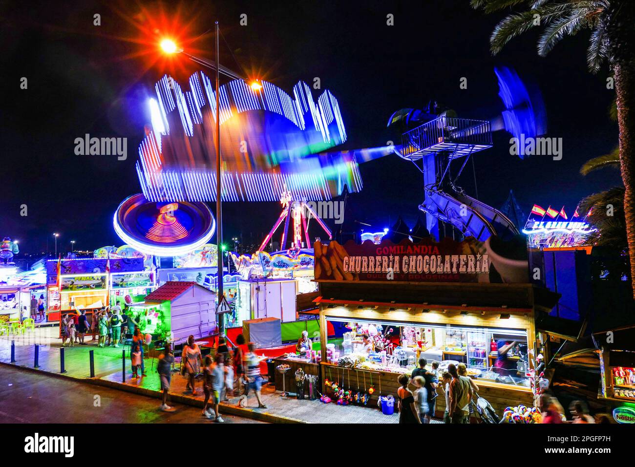 Shops, funfair, stalls in the seaside town of Torrevieja, Spain Stock