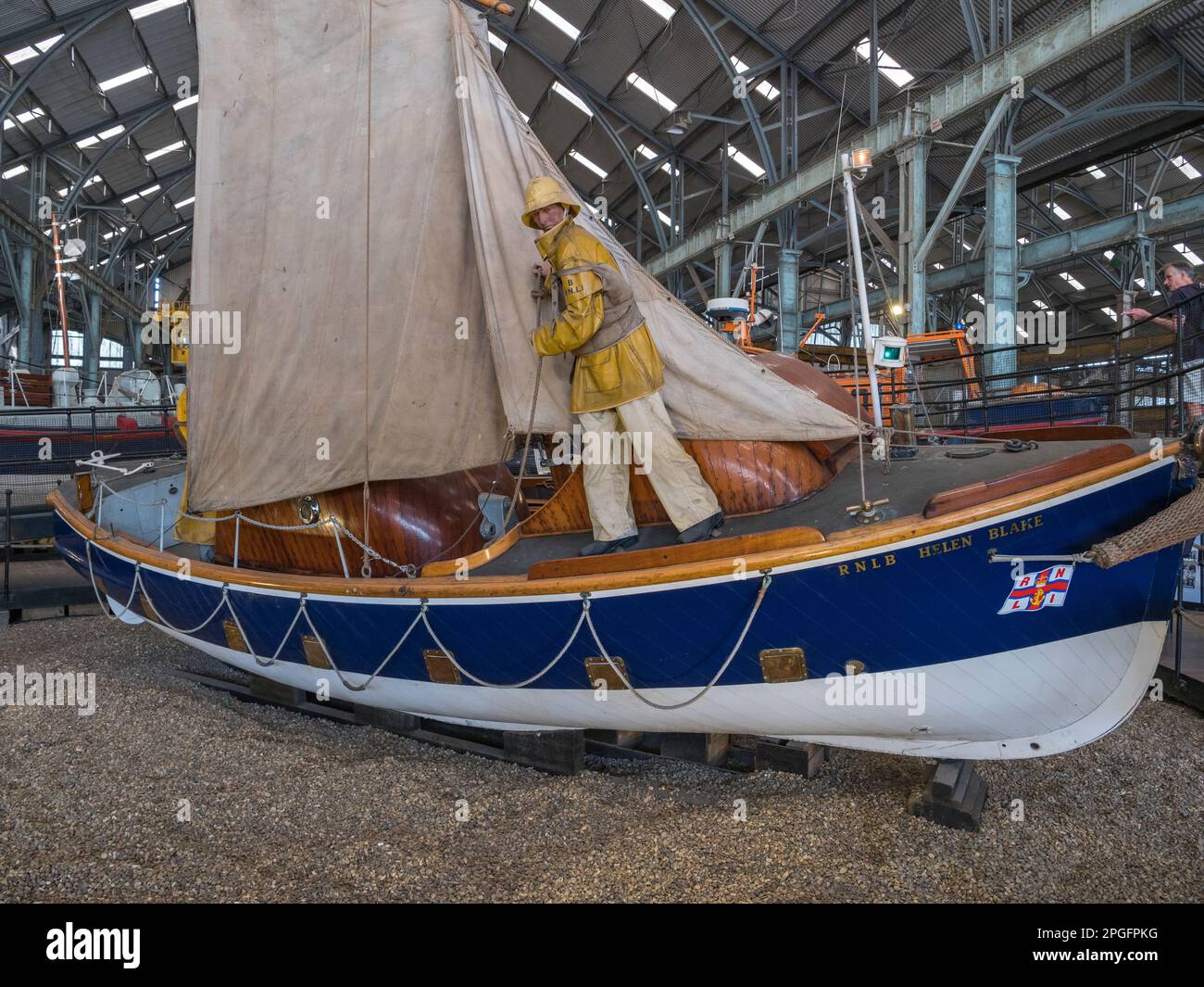 The 'Helen Blake', a Harbour type lifeboat in the RNLI Historic Lifeboat Collection, Historic Dockyard Chatham, Kent, UK. Stock Photo