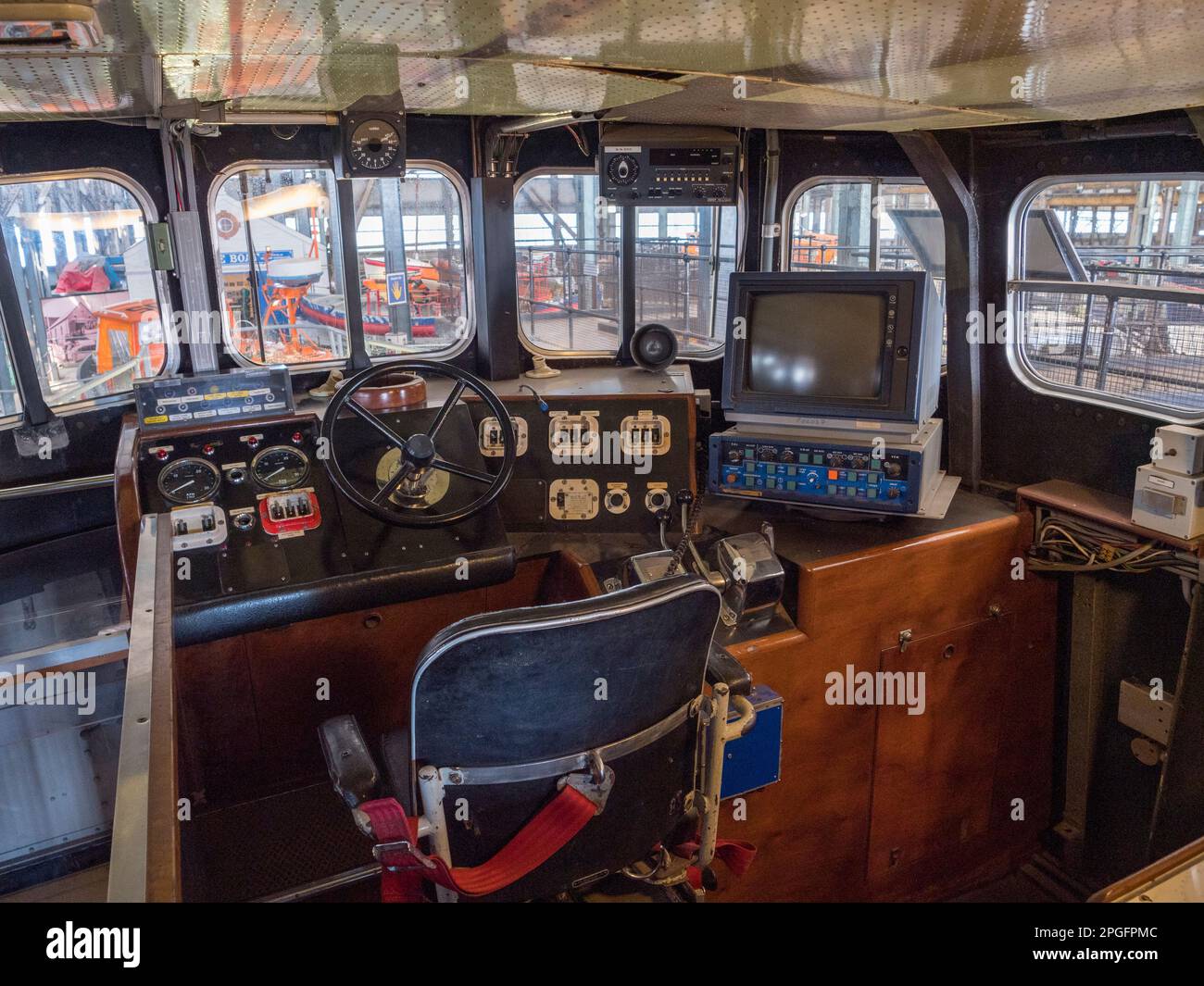 Inside the bridge of the 'Edward Bridges', an Arun class lifeboat RNLI Historic Lifeboat Collection, Historic Dockyard Chatham, Kent, UK. Stock Photo