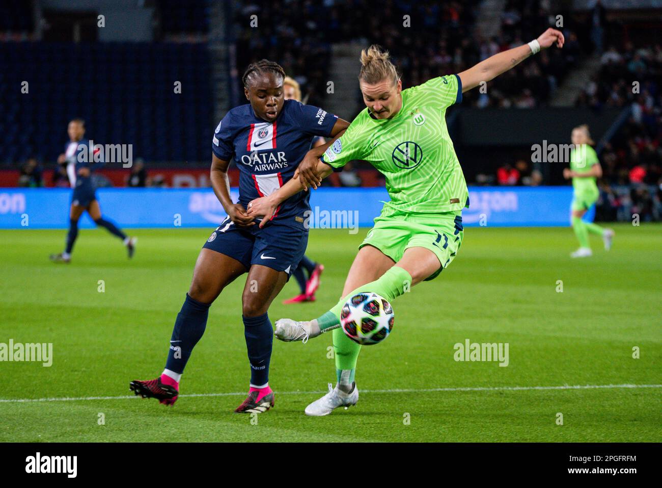 Paris, France. 22nd Mar, 2023. Sandy Baltimore of Paris Saint Germain and Alexandra Popp of VFL Wolfsburg fight for the ball during the UEFA Women's Champions League, Quarter-finals, 1st leg football match between Paris Saint-Germain and VfL Wolfsburg on March 22, 2023 at Parc des Princes stadium in Paris, France - Photo Melanie Laurent/A2M Sport Consulting/DPPI Credit: DPPI Media/Alamy Live News Stock Photo