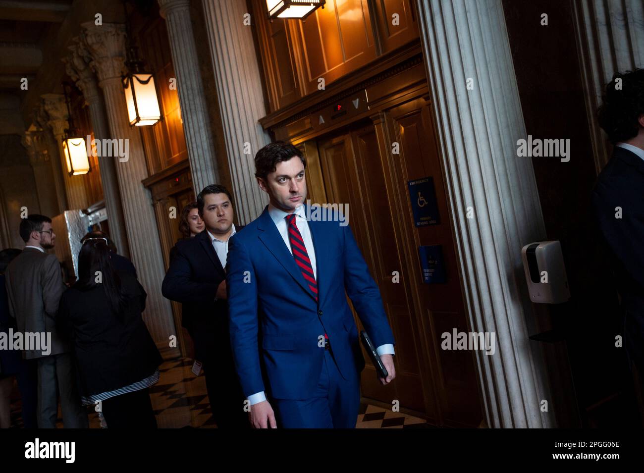 Washington, Vereinigte Staaten. 22nd Mar, 2023. United States Senator Jon Ossoff (Democrat of Georgia) passes by the Senate chamber at the US Capitol in Washington, DC, Wednesday, March 22, 2023. Credit: Rod Lamkey/CNP/dpa/Alamy Live News Stock Photo